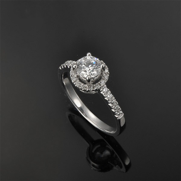 Inexpensive halo clearance engagement rings