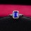Antique 1.50 Carat emerald cut Blue Sapphire and Diamond Halo Engagement Ring in White Gold