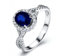 2 Carat oval cut Blue Sapphire and Diamond Halo Engagement Ring in White Gold