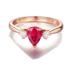 Trilogy Half Carat Pear Shape Ruby and Round Diamond Engagement Ring in Rose Gold