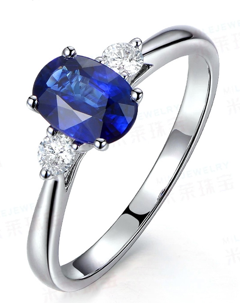 Trilogy Half Carat Oval Cut Sapphire And Round Diamond Engagement Ring