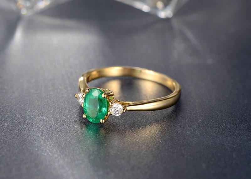 Trilogy Half Carat oval cut Emerald and Round Diamond Engagement Ring in Yellow Gold JeenJewels