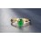 Trilogy Half Carat oval cut Emerald and Round Diamond Engagement Ring in Yellow Gold