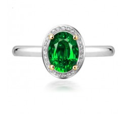 1 Carat oval cut Emerald and Diamond Halo Engagement Ring in White Gold