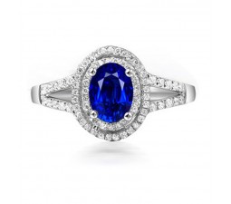 2 Carat oval cut Blue Sapphire and Diamond Halo Engagement Ring in White Gold
