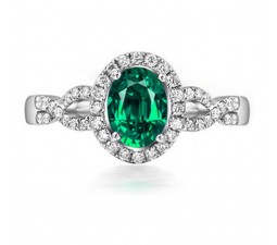 1 Carat Emerald and Diamond Halo Engagement Ring in White Gold