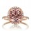 1.5 Carat Oval Classic Emerald and diamond halo ring on 10k Rose Gold