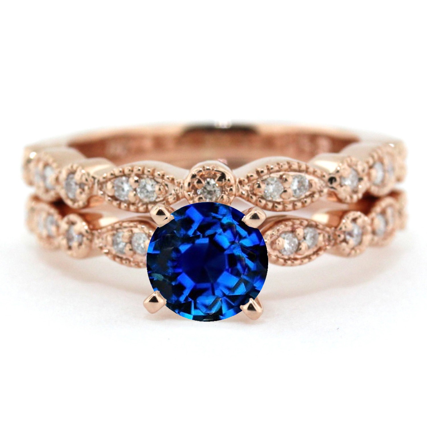 2.00 carat Round Cut Sapphire and Diamond Halo Bridal Set in 10k Rose 2.00 carat Round Cut Sapphire and Diamond Halo Bridal Set in 10k Rose