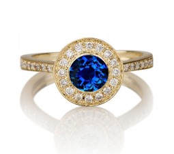 1.25 carat Round Cut Sapphire and Diamond Halo Engagement Ring in 10k Yellow Gold