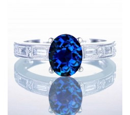 1.5 Carat Oval Cut Sapphire and Baguette Diamond Milgrain Engagement Ring on 10k White Gold
