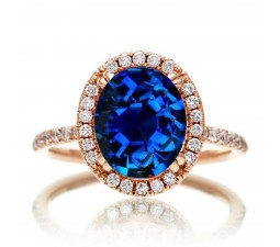 1.5 Carat Oval Classic Sapphire and diamond halo ring on 10k Rose Gold